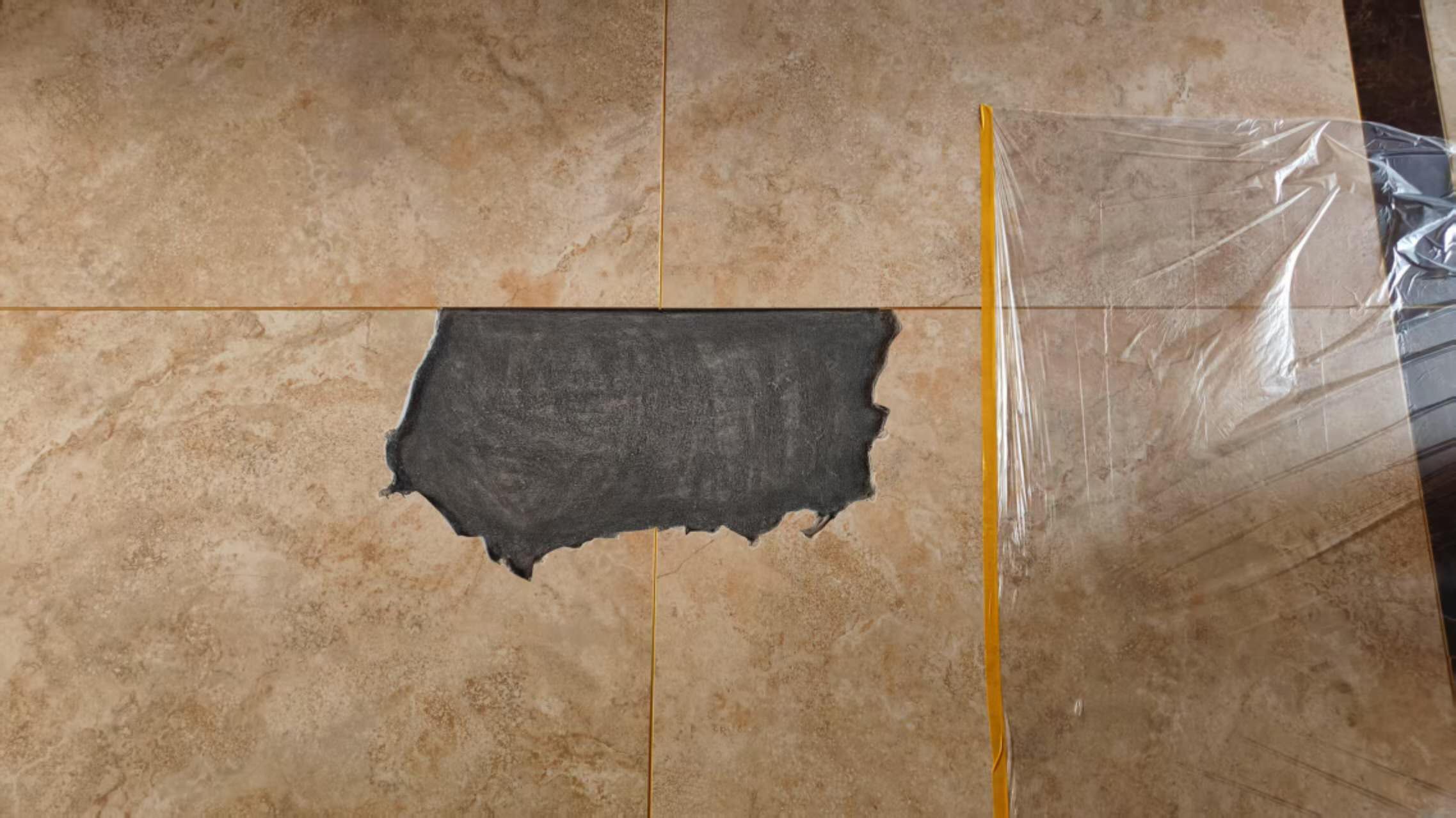 Before ceramic tile repair